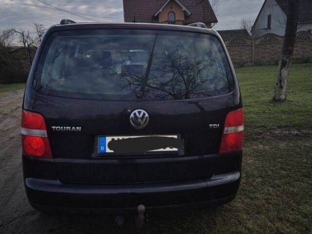 Черный Фольксваген Туран, объемом двигателя 1.9 л и пробегом 217 тыс. км за 2550 $, фото 3 на Automoto.ua