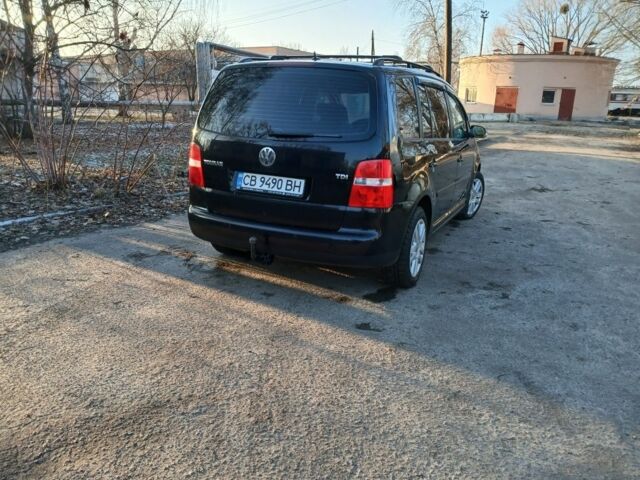 Чорний Фольксваген Туран, об'ємом двигуна 1.9 л та пробігом 302 тис. км за 6699 $, фото 3 на Automoto.ua