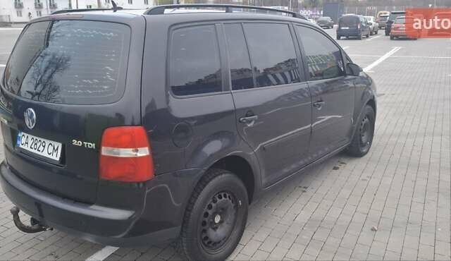Чорний Фольксваген Туран, об'ємом двигуна 2 л та пробігом 485 тис. км за 4300 $, фото 1 на Automoto.ua