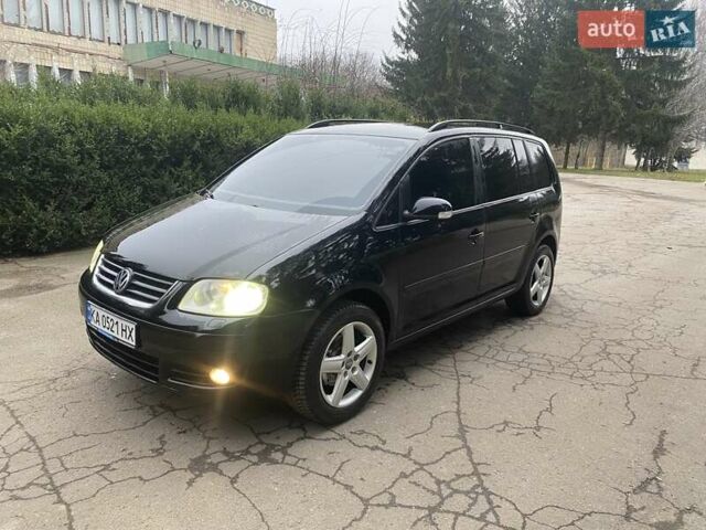 Чорний Фольксваген Туран, об'ємом двигуна 1.9 л та пробігом 390 тис. км за 6500 $, фото 1 на Automoto.ua