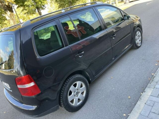 Чорний Фольксваген Туран, об'ємом двигуна 2 л та пробігом 1 тис. км за 3200 $, фото 2 на Automoto.ua