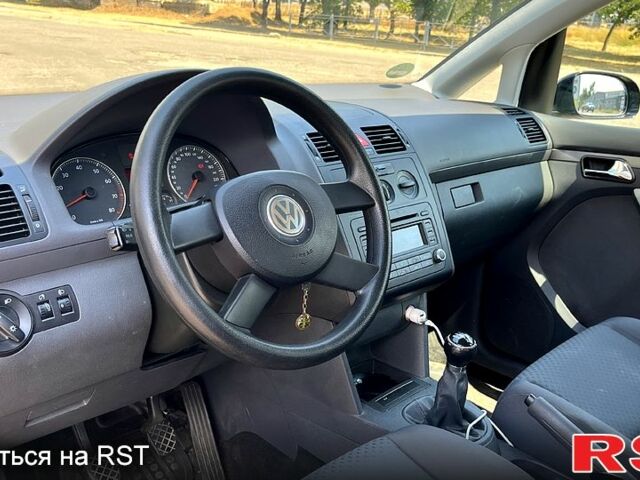 Черный Фольксваген Туран, объемом двигателя 1.4 л и пробегом 293 тыс. км за 3400 $, фото 4 на Automoto.ua