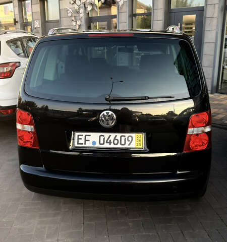 Черный Фольксваген Туран, объемом двигателя 1.6 л и пробегом 190 тыс. км за 6999 $, фото 19 на Automoto.ua
