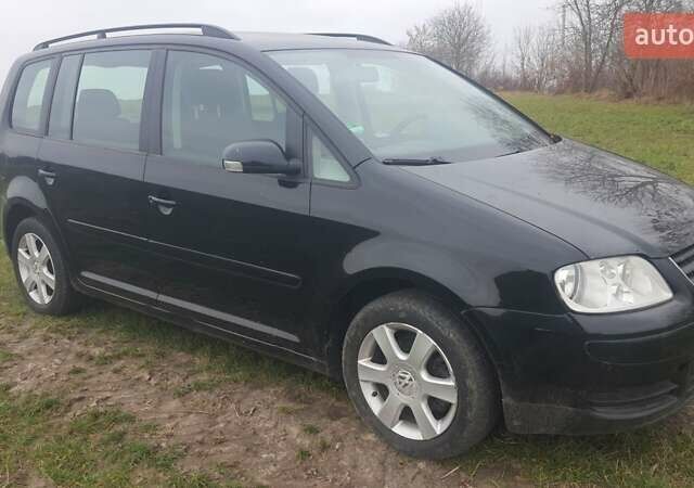 Черный Фольксваген Туран, объемом двигателя 1.6 л и пробегом 200 тыс. км за 5500 $, фото 9 на Automoto.ua