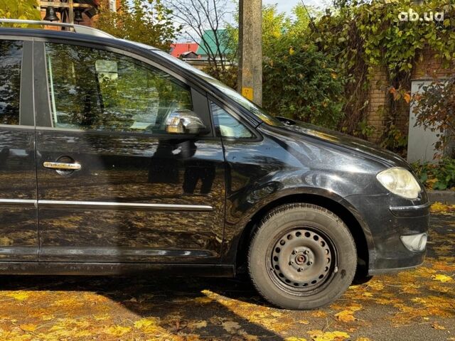 Фольксваген Туран 2007 в Киеве на Automoto.ua Черный Фольксваген Туран, объемом двигателя 1.4 л и пробегом 242 тыс. км за 6390 $, фото 3 на Automoto.ua