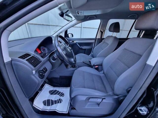 Черный Фольксваген Туран, объемом двигателя 1.4 л и пробегом 193 тыс. км за 7300 $, фото 3 на Automoto.ua