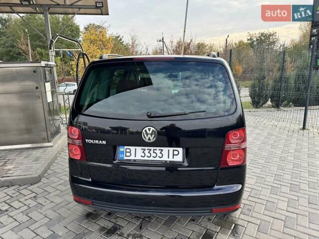 Чорний Фольксваген Туран, об'ємом двигуна 1.97 л та пробігом 313 тис. км за 7500 $, фото 36 на Automoto.ua