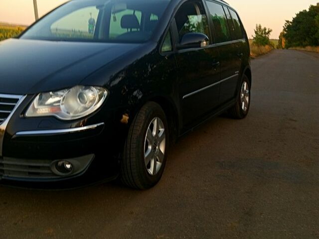 Чорний Фольксваген Туран, об'ємом двигуна 1.4 л та пробігом 207 тис. км за 7200 $, фото 2 на Automoto.ua