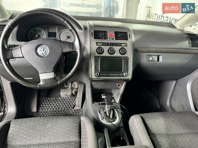 Чорний Фольксваген Туран, об'ємом двигуна 1.97 л та пробігом 313 тис. км за 7500 $, фото 3 на Automoto.ua