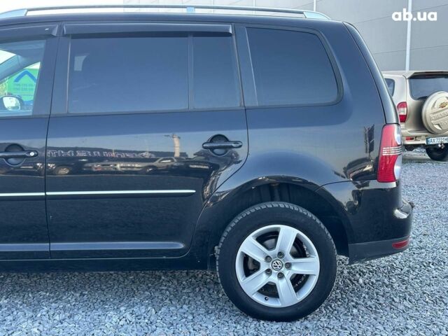 Черный Фольксваген Туран, объемом двигателя 2 л и пробегом 260 тыс. км за 7890 $, фото 4 на Automoto.ua