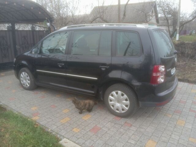 Чорний Фольксваген Туран, об'ємом двигуна 1.4 л та пробігом 268 тис. км за 5600 $, фото 1 на Automoto.ua