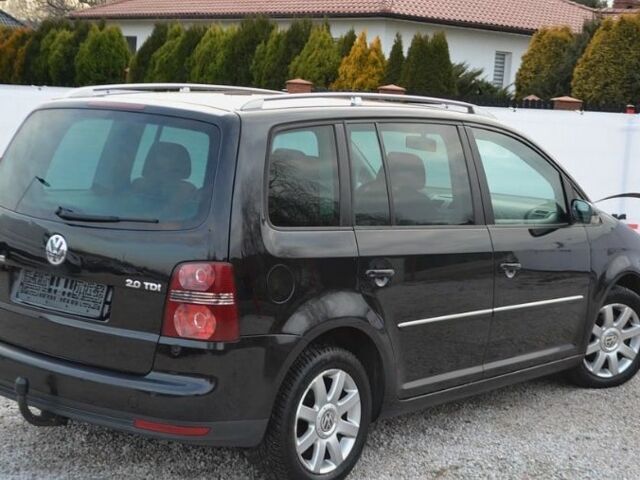 Черный Фольксваген Туран, объемом двигателя 2 л и пробегом 216 тыс. км за 5399 $, фото 5 на Automoto.ua