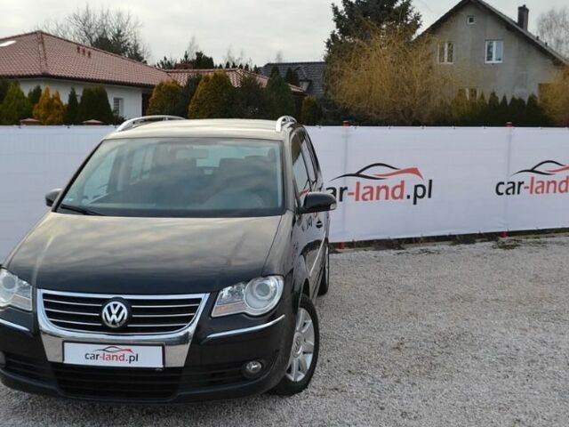 Черный Фольксваген Туран, объемом двигателя 2 л и пробегом 216 тыс. км за 5399 $, фото 2 на Automoto.ua