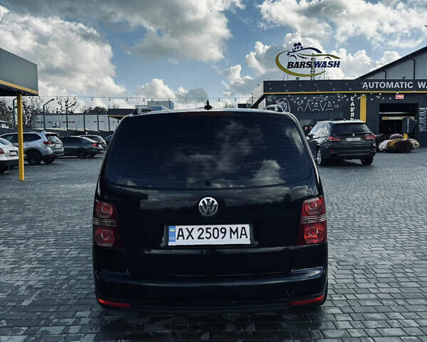 Черный Фольксваген Туран, объемом двигателя 1.39 л и пробегом 242 тыс. км за 7500 $, фото 5 на Automoto.ua