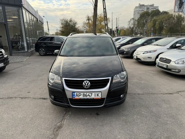 Черный Фольксваген Туран, объемом двигателя 1.9 л и пробегом 278 тыс. км за 7100 $, фото 1 на Automoto.ua