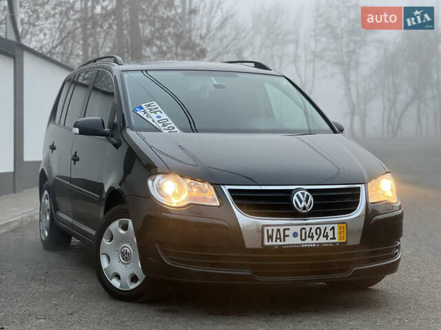 Чорний Фольксваген Туран, об'ємом двигуна 1.4 л та пробігом 248 тис. км за 7199 $, фото 10 на Automoto.ua