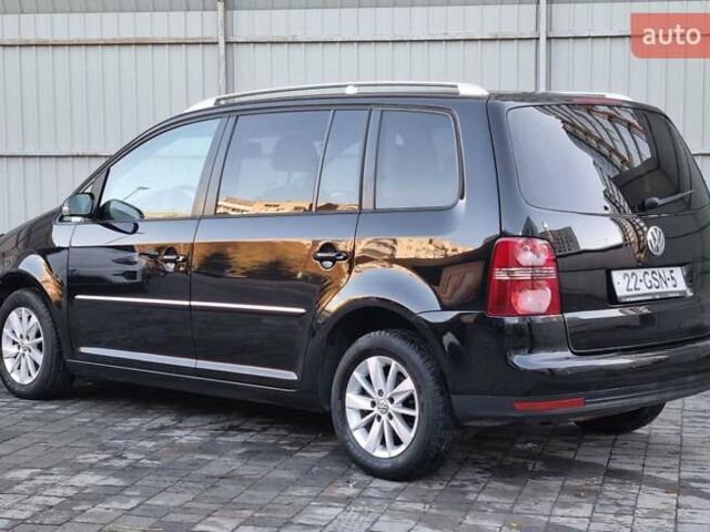 Черный Фольксваген Туран, объемом двигателя 1.4 л и пробегом 193 тыс. км за 7300 $, фото 34 на Automoto.ua