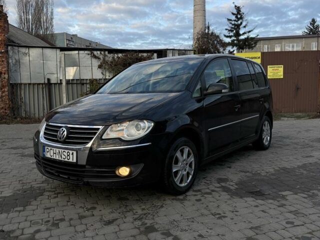 Черный Фольксваген Туран, объемом двигателя 2 л и пробегом 300 тыс. км за 3300 $, фото 2 на Automoto.ua