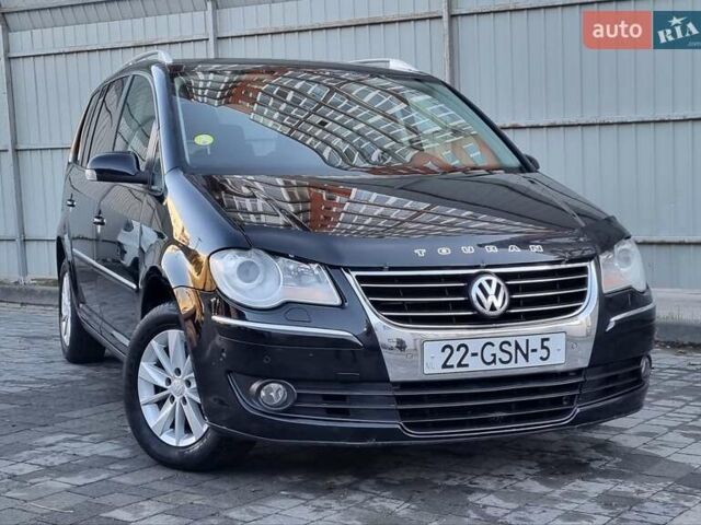 Черный Фольксваген Туран, объемом двигателя 1.4 л и пробегом 193 тыс. км за 7300 $, фото 22 на Automoto.ua