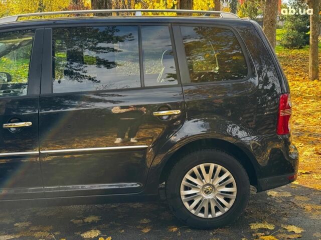 Фольксваген Туран 2007 в Киеве на Automoto.ua Черный Фольксваген Туран, объемом двигателя 1.4 л и пробегом 242 тыс. км за 6390 $, фото 9 на Automoto.ua