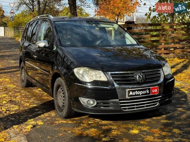 Фольксваген Туран 2007 в Киеве на Automoto.ua Черный Фольксваген Туран, объемом двигателя 1.4 л и пробегом 242 тыс. км за 6390 $, фото 2 на Automoto.ua