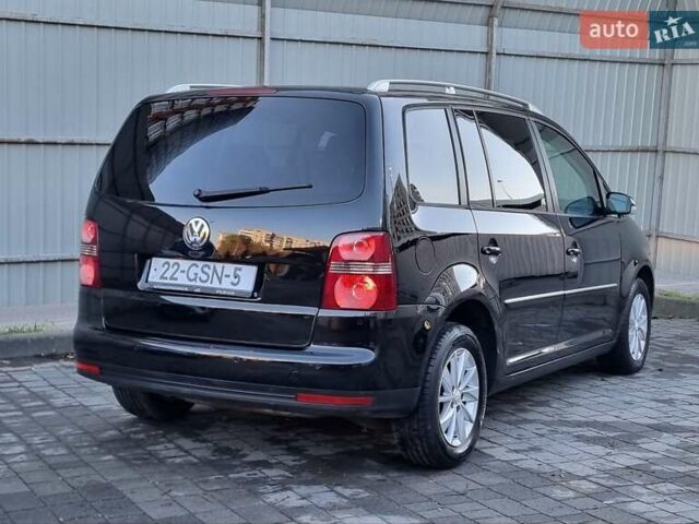 Черный Фольксваген Туран, объемом двигателя 1.4 л и пробегом 193 тыс. км за 7300 $, фото 27 на Automoto.ua