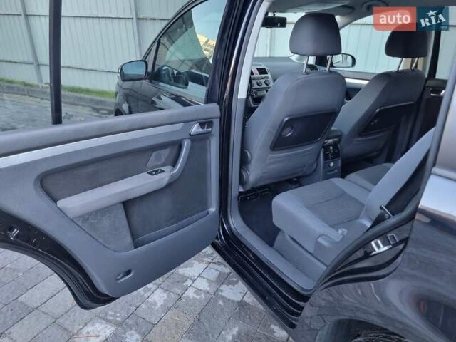 Черный Фольксваген Туран, объемом двигателя 1.4 л и пробегом 193 тыс. км за 7300 $, фото 4 на Automoto.ua