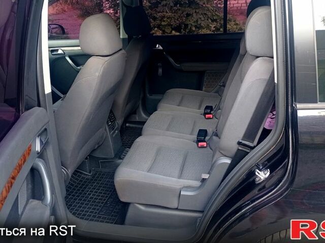 Черный Фольксваген Туран, объемом двигателя 1.4 л и пробегом 233 тыс. км за 6800 $, фото 4 на Automoto.ua