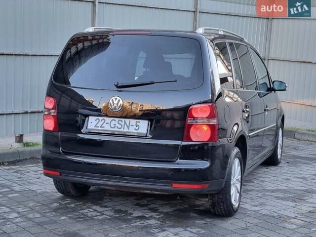Черный Фольксваген Туран, объемом двигателя 1.4 л и пробегом 193 тыс. км за 7300 $, фото 26 на Automoto.ua