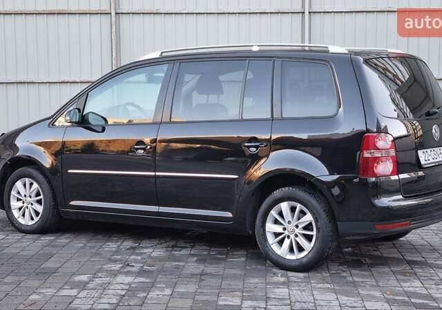 Черный Фольксваген Туран, объемом двигателя 1.4 л и пробегом 193 тыс. км за 7300 $, фото 35 на Automoto.ua