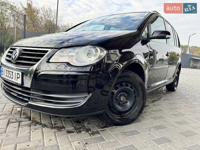 Чорний Фольксваген Туран, об'ємом двигуна 1.97 л та пробігом 313 тис. км за 7500 $, фото 32 на Automoto.ua