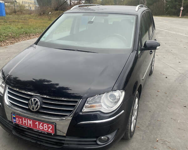 Чорний Фольксваген Туран, об'ємом двигуна 1.39 л та пробігом 187 тис. км за 6500 $, фото 8 на Automoto.ua