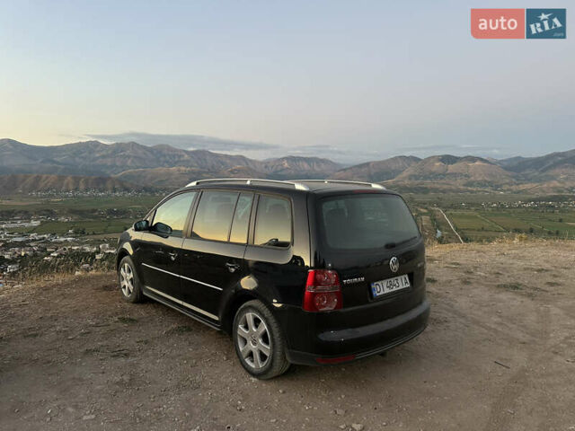 Чорний Фольксваген Туран, об'ємом двигуна 1.97 л та пробігом 270 тис. км за 8300 $, фото 1 на Automoto.ua