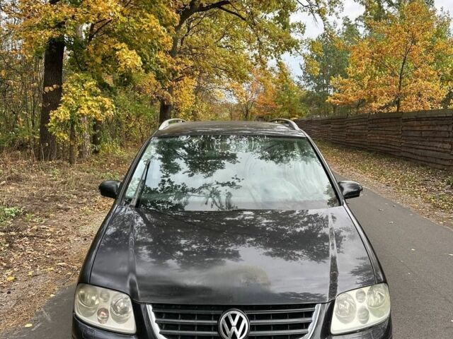 Черный Фольксваген Туран, объемом двигателя 1.9 л и пробегом 244 тыс. км за 1650 $, фото 1 на Automoto.ua