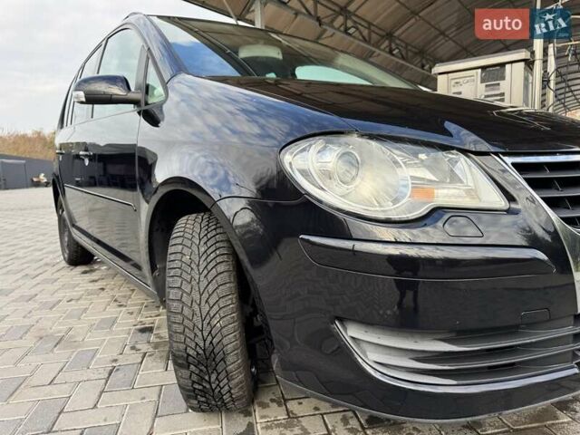 Чорний Фольксваген Туран, об'ємом двигуна 1.97 л та пробігом 313 тис. км за 7500 $, фото 28 на Automoto.ua