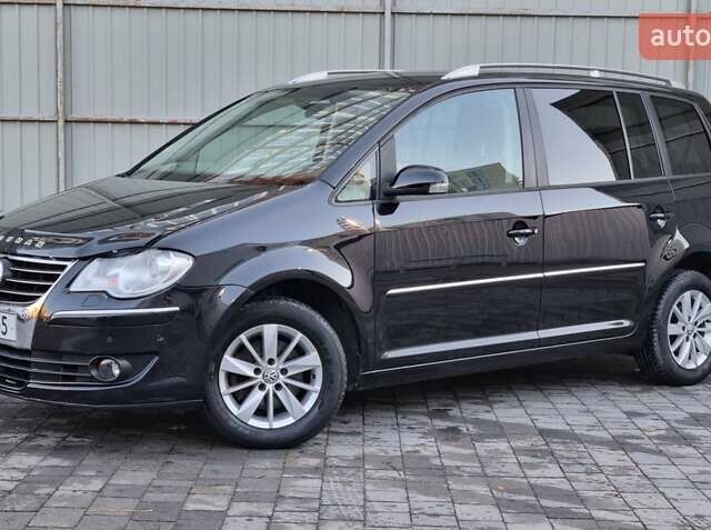 Черный Фольксваген Туран, объемом двигателя 1.4 л и пробегом 193 тыс. км за 7300 $, фото 20 на Automoto.ua