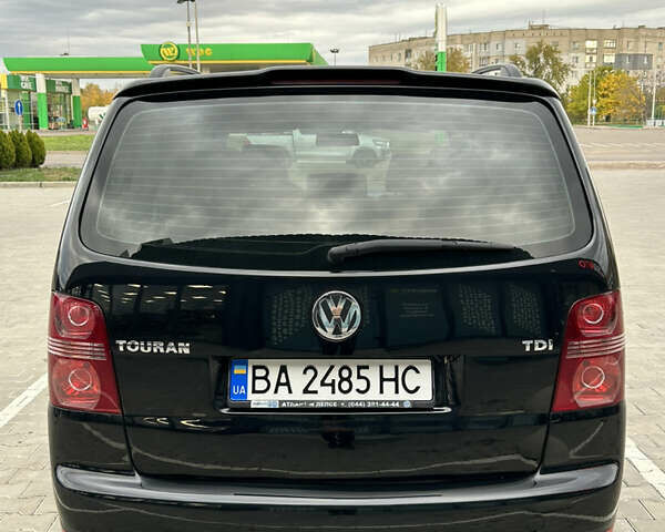 Чорний Фольксваген Туран, об'ємом двигуна 1.9 л та пробігом 124 тис. км за 8700 $, фото 6 на Automoto.ua