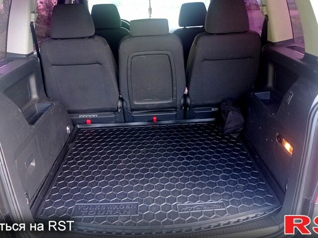 Черный Фольксваген Туран, объемом двигателя 1.4 л и пробегом 233 тыс. км за 6800 $, фото 5 на Automoto.ua
