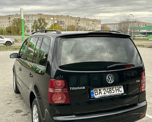 Чорний Фольксваген Туран, об'ємом двигуна 1.9 л та пробігом 124 тис. км за 8700 $, фото 7 на Automoto.ua