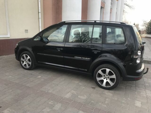 Черный Фольксваген Туран, объемом двигателя 1.4 л и пробегом 260 тыс. км за 6500 $, фото 1 на Automoto.ua