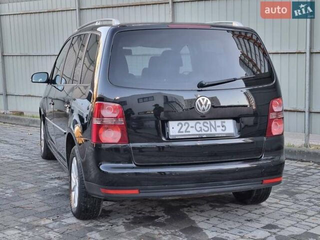 Черный Фольксваген Туран, объемом двигателя 1.4 л и пробегом 193 тыс. км за 7300 $, фото 31 на Automoto.ua