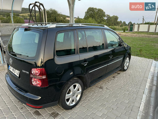 Чорний Фольксваген Туран, об'ємом двигуна 1.97 л та пробігом 270 тис. км за 8300 $, фото 6 на Automoto.ua