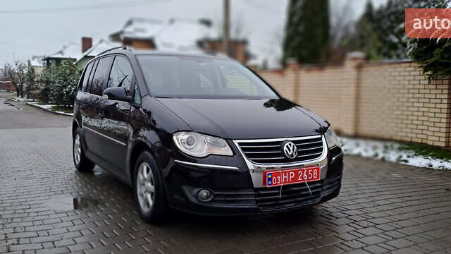 Черный Фольксваген Туран, объемом двигателя 1.4 л и пробегом 193 тыс. км за 6950 $, фото 7 на Automoto.ua