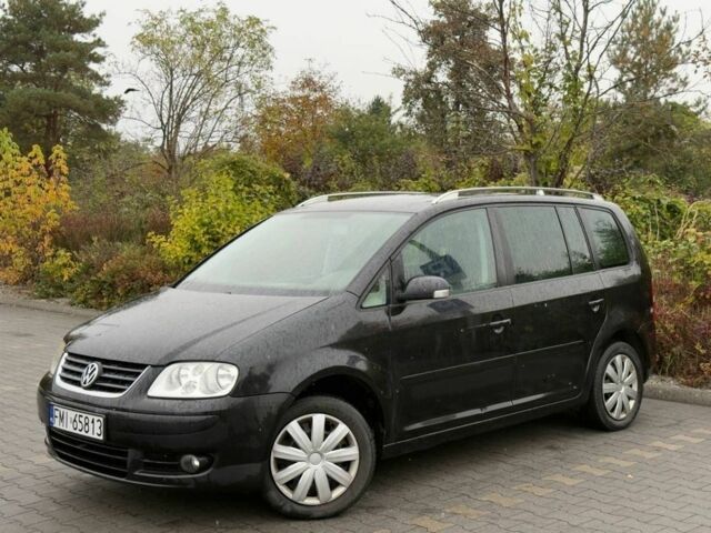 Черный Фольксваген Туран, объемом двигателя 1.9 л и пробегом 225 тыс. км за 2450 $, фото 1 на Automoto.ua
