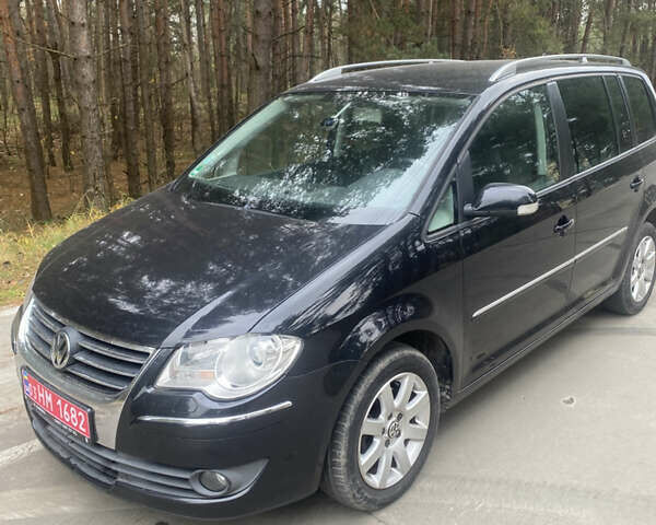 Чорний Фольксваген Туран, об'ємом двигуна 1.39 л та пробігом 187 тис. км за 6500 $, фото 9 на Automoto.ua