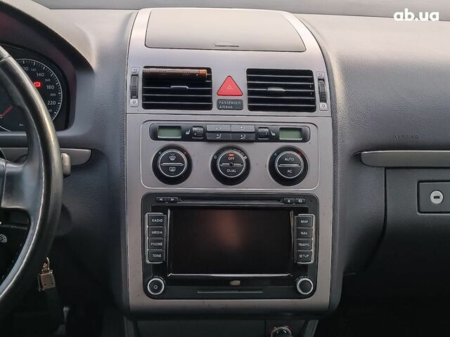 Чорний Фольксваген Туран, об'ємом двигуна 2 л та пробігом 260 тис. км за 9390 $, фото 17 на Automoto.ua