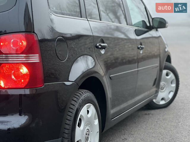 Чорний Фольксваген Туран, об'ємом двигуна 1.4 л та пробігом 248 тис. км за 7199 $, фото 40 на Automoto.ua