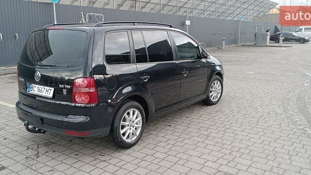Черный Фольксваген Туран, объемом двигателя 2 л и пробегом 249 тыс. км за 8400 $, фото 16 на Automoto.ua