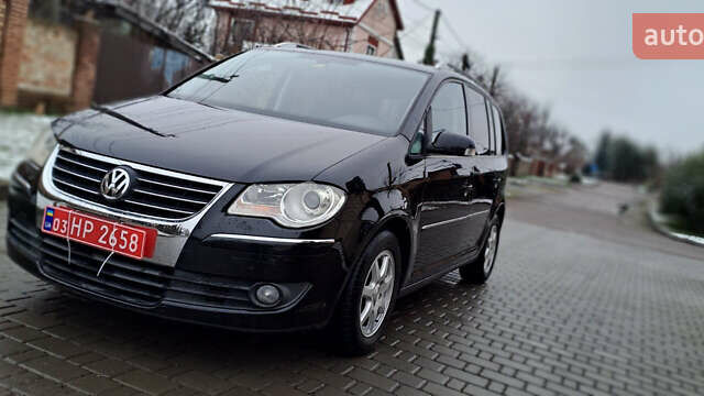 Черный Фольксваген Туран, объемом двигателя 1.4 л и пробегом 193 тыс. км за 6950 $, фото 6 на Automoto.ua