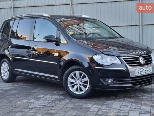 Черный Фольксваген Туран, объемом двигателя 1.4 л и пробегом 193 тыс. км за 7300 $, фото 24 на Automoto.ua